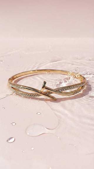 Twisted Pave Crystal Inlaid Stainless Steel Gold Plated Hinged Bangle